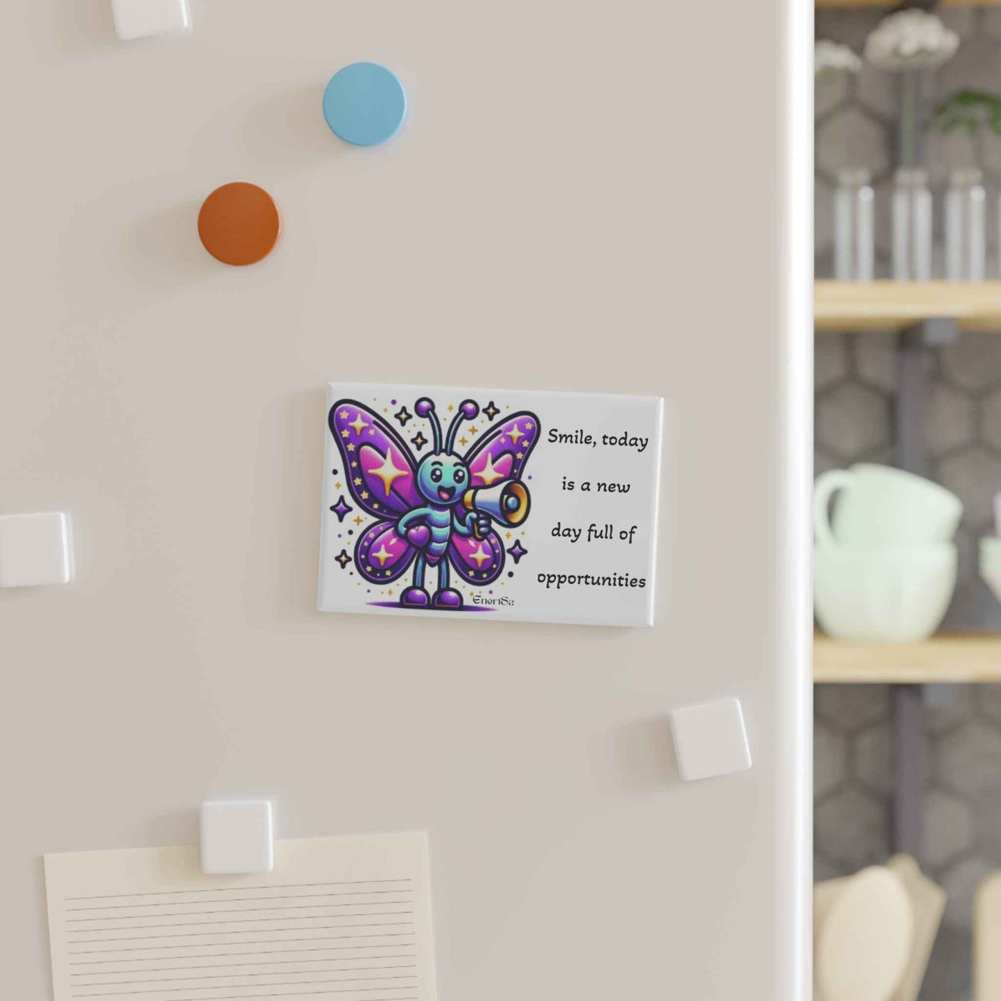 Imán "Colección Sonrisa" con mariposa y mensaje inspirador.